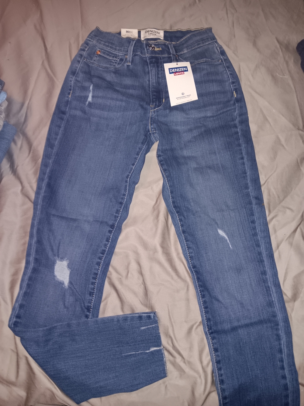 Denizen from Levi's Women's Medium Blue Skinny Jeans with Light Distressing